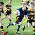 Bambini che giocano a rugby. Repertorio