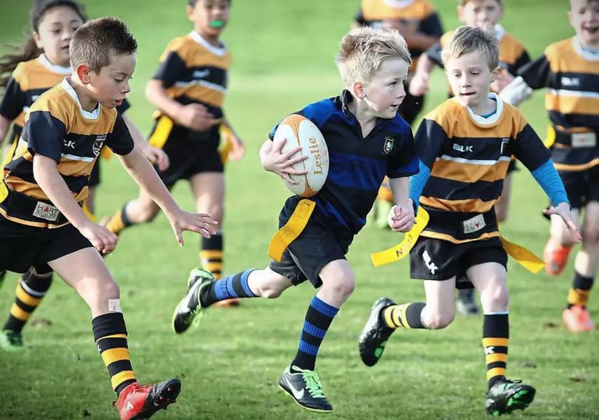 Bambini che giocano a rugby. Repertorio