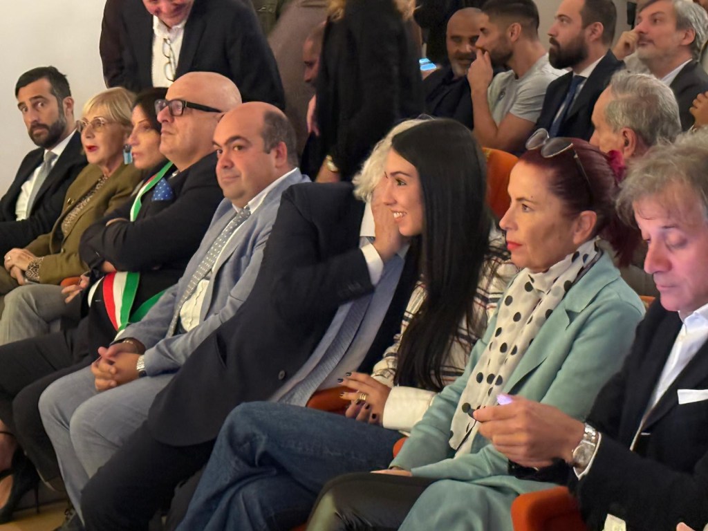 Event attendees seated during the ceremonial celebration for the 100th anniversary of Ternana Calcio at Palazzo Primavera in Terni.