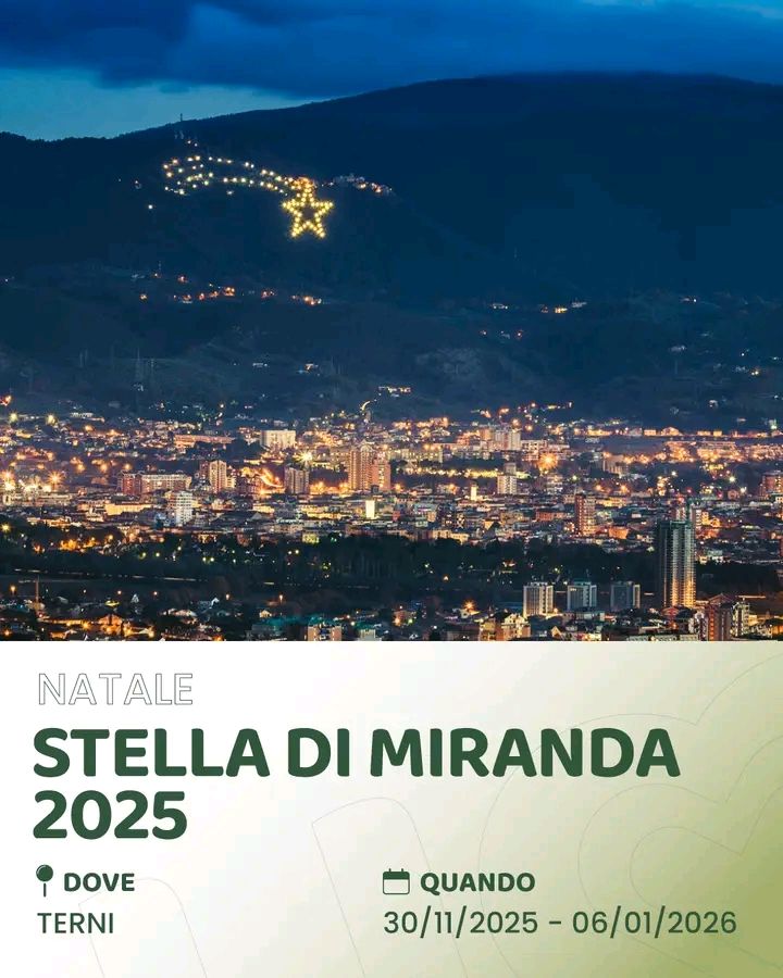 Vista della Stella di Miranda illuminata sulla montagna, con la città di Terni visibile in primo piano, al tramonto.