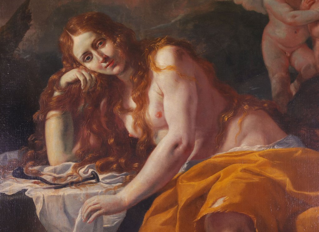 A reclining female figure with long red hair, resting her chin on her hand and gazing towards the viewer, draped in a vibrant orange cloth, against a dark background with cherubs in the upper corner.